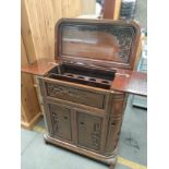 A Oriental carved buffet cabinet