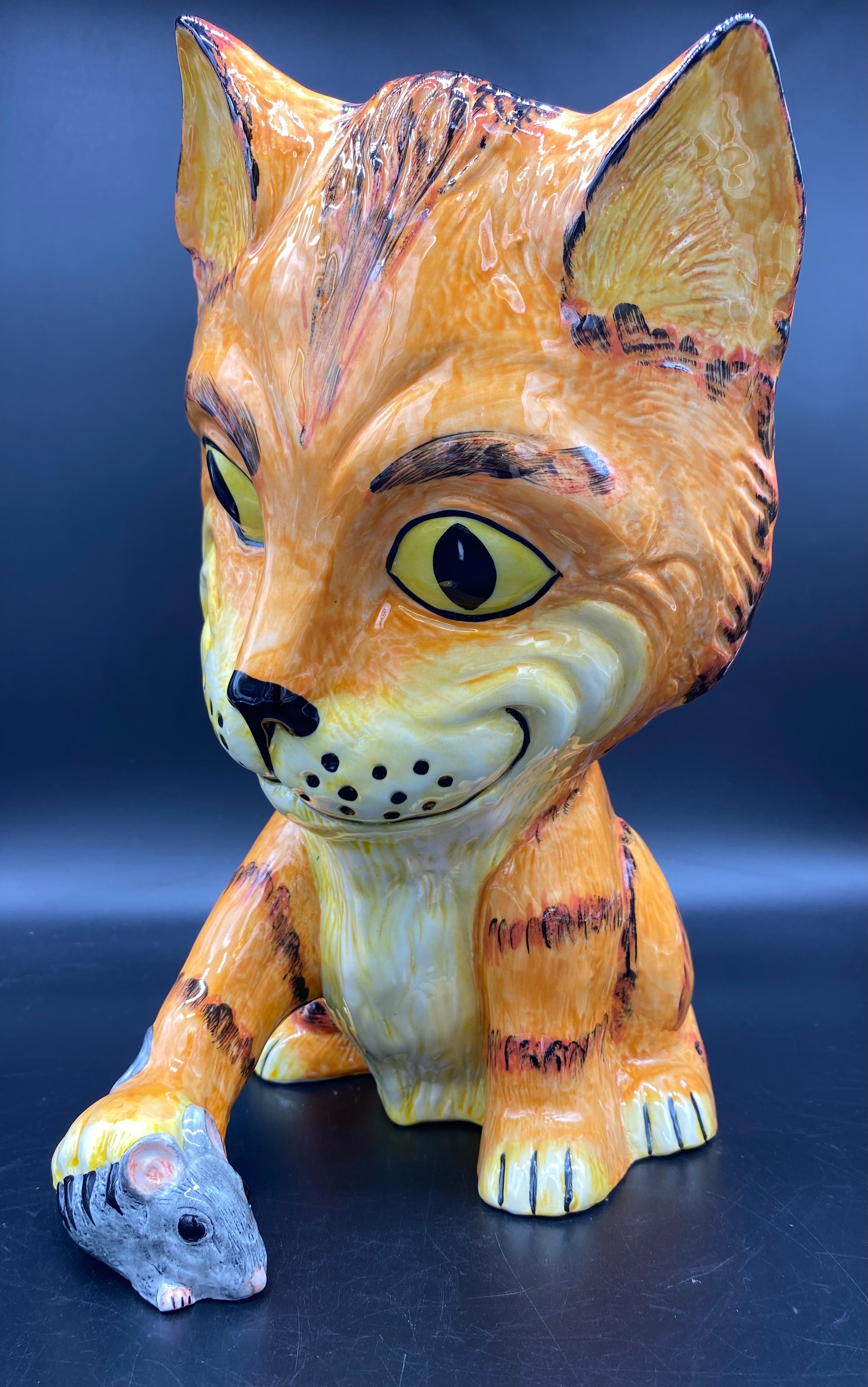 Lorna Bailey ceramic cat figurine in orange and yellow glaze. Signed, 13/75 [30cm high]