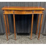Antique style console table, the shaped top above a shaped apron with carved additions, raised on