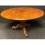 19th century flip top parlour table, supported on a turned pedestal with three outswept legs. [