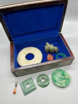 Indian box containing various Chinese Jade and hardstone carvings. Also includes and antique