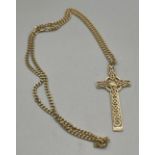 9ct yellow gold Celtic design crucifix pendant together with a 9ct yellow gold Curb necklace. [22.