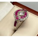 A Sterling silver, Rublite and white stone Art Deco dress ring. [Ring size O]