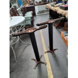 A Pair of antique bar table metal bases