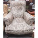 Vintage armchair on castor feet