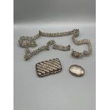 Sterling silver oval shaped pill box, Birmingham silver snuff box and silver woven eastern belt.
