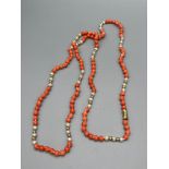 A Coral, pearl and gold bead necklace fitted with a 14ct yellow gold clasp.