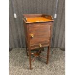 19th century side cabinet, the gallery tray top, above a door opening to interior storage and pull