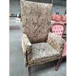 19th century high back arm chair.