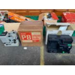 Box of tripods together with box eumig cini projectors etc