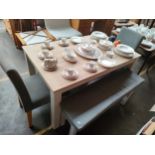 Modern contemporary dining room table consisting of 2 benches & 2 chairs