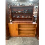 Mid century teak bookcase together with 3 shelved book case