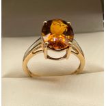 10ct yellow gold ladies ring set with a large Citrine stone. [Ring size [3.24grams]