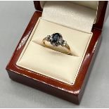 9ct yellow gold sapphire and diamond ring. [Ring size R] [2.56grams]