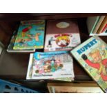 A collection of books to include Rupert, broons books etc