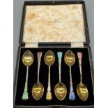 A Boxed set of 6 Birmingham silver and enamel tea spoons produced by Walker & Hall.