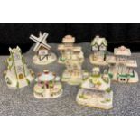 A Collection of Coalport miniature house Pastille burners.