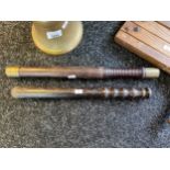 Two early 19th century truncheons, large antique school bell and vintage war gas alarm rattle.