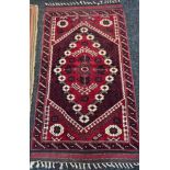 Antique Indian/ Persian hand made red ground rug. [175x97cm]