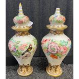 Pair of Bohemian enamelled milk glass vases and covers circa 1900, each of baluster form painted