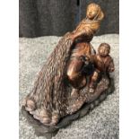 Antique Chinese hand carved soapstone figure sculpture. Depicts fisherwomen and child pulling the