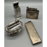 A Lot of four vintage lighters, Everest 925 London import silver lighter, Ladies Dunhill lighter