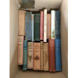 A Box of antique books to include ' five children in it' the phoenix and the carpet, the enchanted