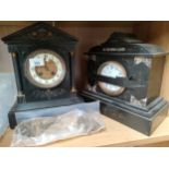 Two slate mantel clocks. [Need attention]