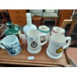 Selection of vintage tankards and Sherry and Port ceramic barrels.