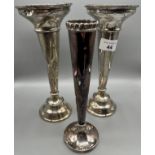 A Pair of Birmingham silver tall and weighted bud vases, Together with a tall and weighted Sheffield