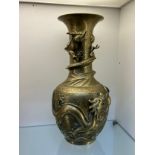 Late 19th century Chinese Bronze vase Xuande Seal. Designed with raised relief dragon wrapped around