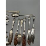 A Collection of mixed Sheffield silver flatwares. includes Tongs, Knives and spoons. [Total