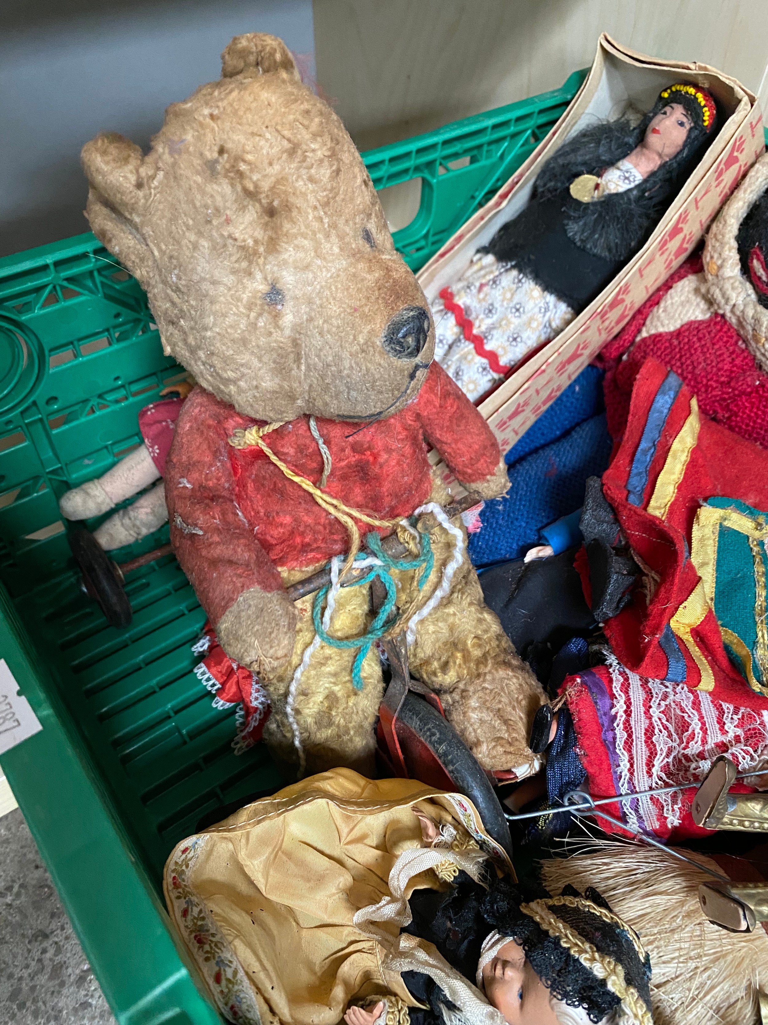 A Box of antique and vintage mixed world dolls, puppets and teddies. Includes Robinsons teddy, Two