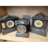 A Shelf of four slate mantel clocks, Three with workings.
