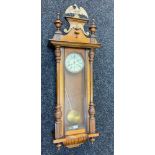 Large Vienna wall clock with eagle finial.