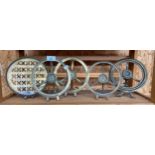 Five antique brass fireplace trivet stands.