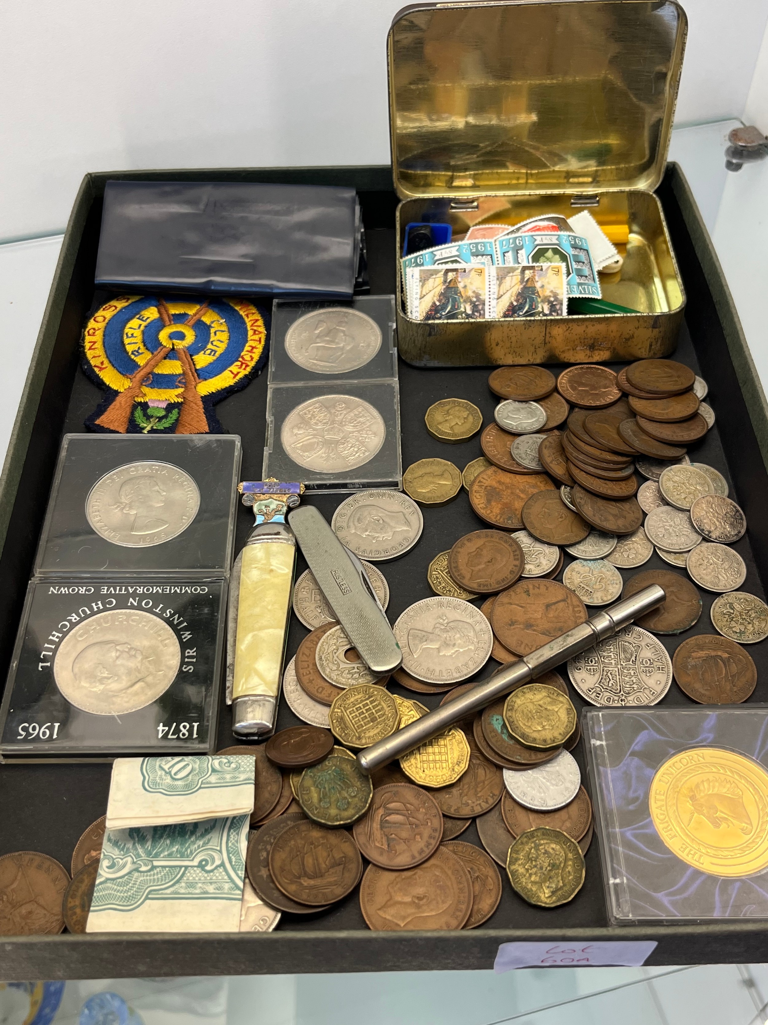 Tray of mixed world coins, stamps and odds