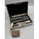 London Silver hammered effect manicure box produced by William Comyns & Sons. Together with an