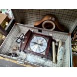 Vintage suitcase containing clocks to include art deco Hermle mantel clock