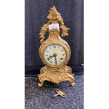 Imperial Italian brass ornate mantel clock with a movement made by Franz Hermle & Sons of Germany