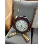 Victorian mother of pearl inlaid wall clock with weights and pendulum.