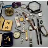 A Collection of mixed watches, cuff links and pins. Watches include makes such as Timex, Sekonda and