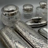 A Collection of London and Birmingham hammered silver dressing table items, Includes Drew & Sons