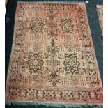 Pakistan red ground ornate rug. [198x147cm]