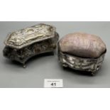 Two Birmingham silver four foot jewel and pin cushion boxes. [Silver jewel box- 108.52grams]