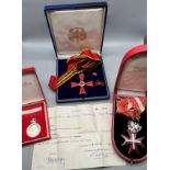 A cased Grand Cross of the Order of the Federal Republic of Germany; cased Austrian neck badge of