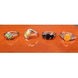 Four 925 silver and gem stone rings includes Ethiopian opal stone set ring.