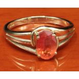 9ct yellow gold ring set with a single oval cut fire opal stone. [Ring size N] [2.36Grams]