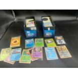 Two boxes of various Pokémon cards