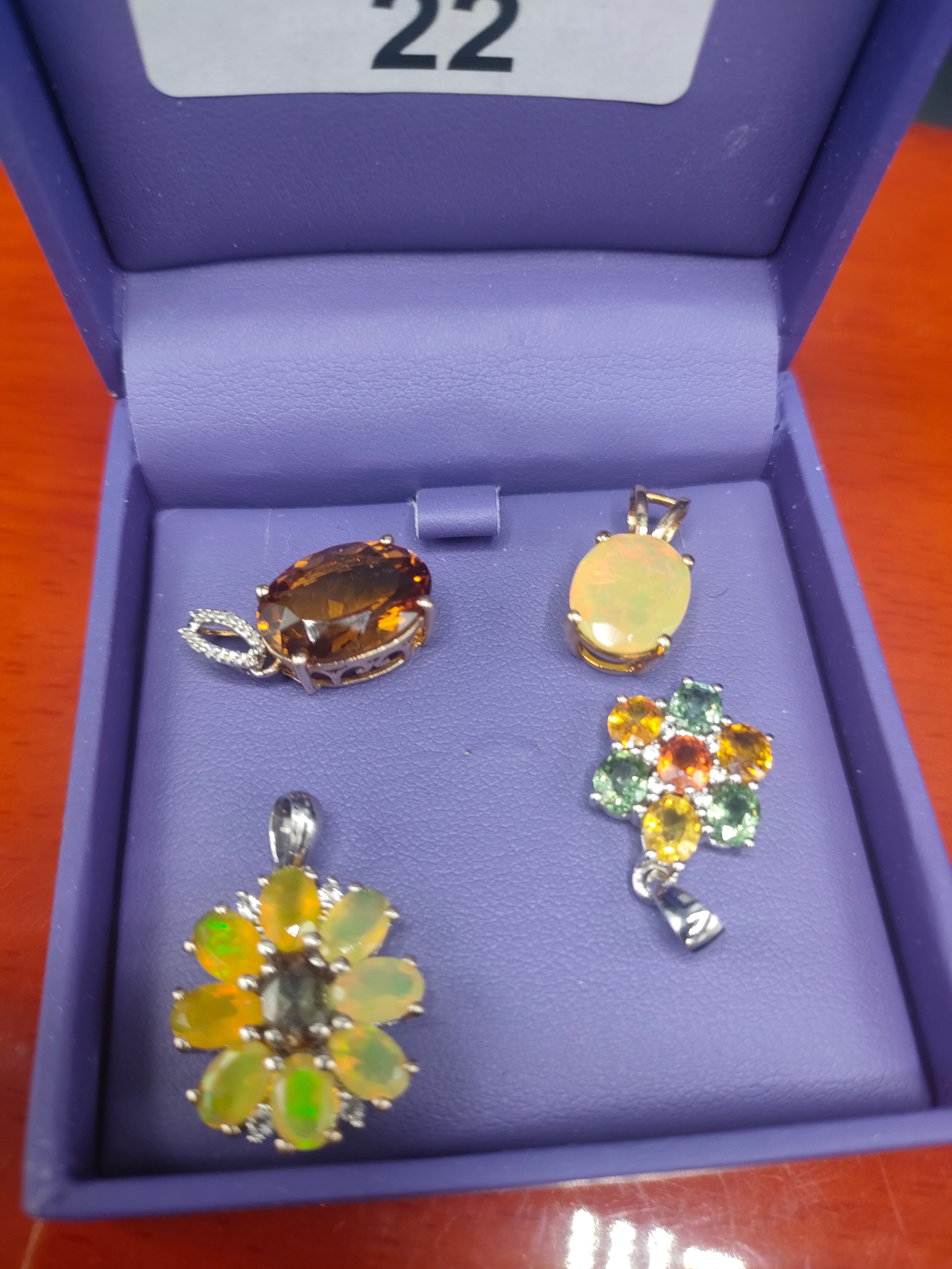 Four various Gold, silver and gem stone pendants. Silver 925 and Ethiopian opal stone set pendant, - Image 2 of 2